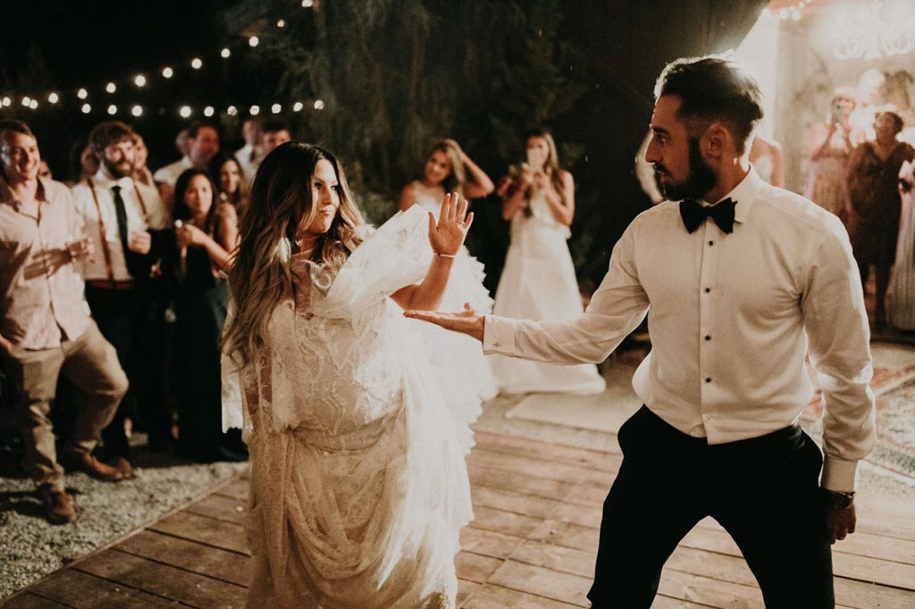 Discover Tiffany and Joey's wedding, who got married in the mountains of South California, in an under a tipi in an open landscape in a boho style wedding.